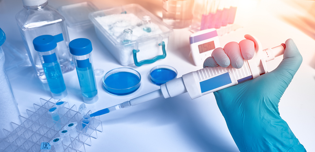 Hand in Glove with Automatic Pipette and Samples, Panoramic Image. Polymerase Chain Reaction PCR Used in Medical Testing, Biochemistry, Molecular Biology, Genetics, Clinical Research in Laboratory.